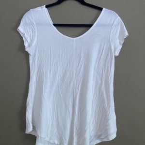 Plain white flowy low cut blouse